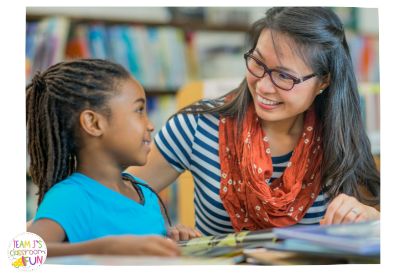 teacher reading with student